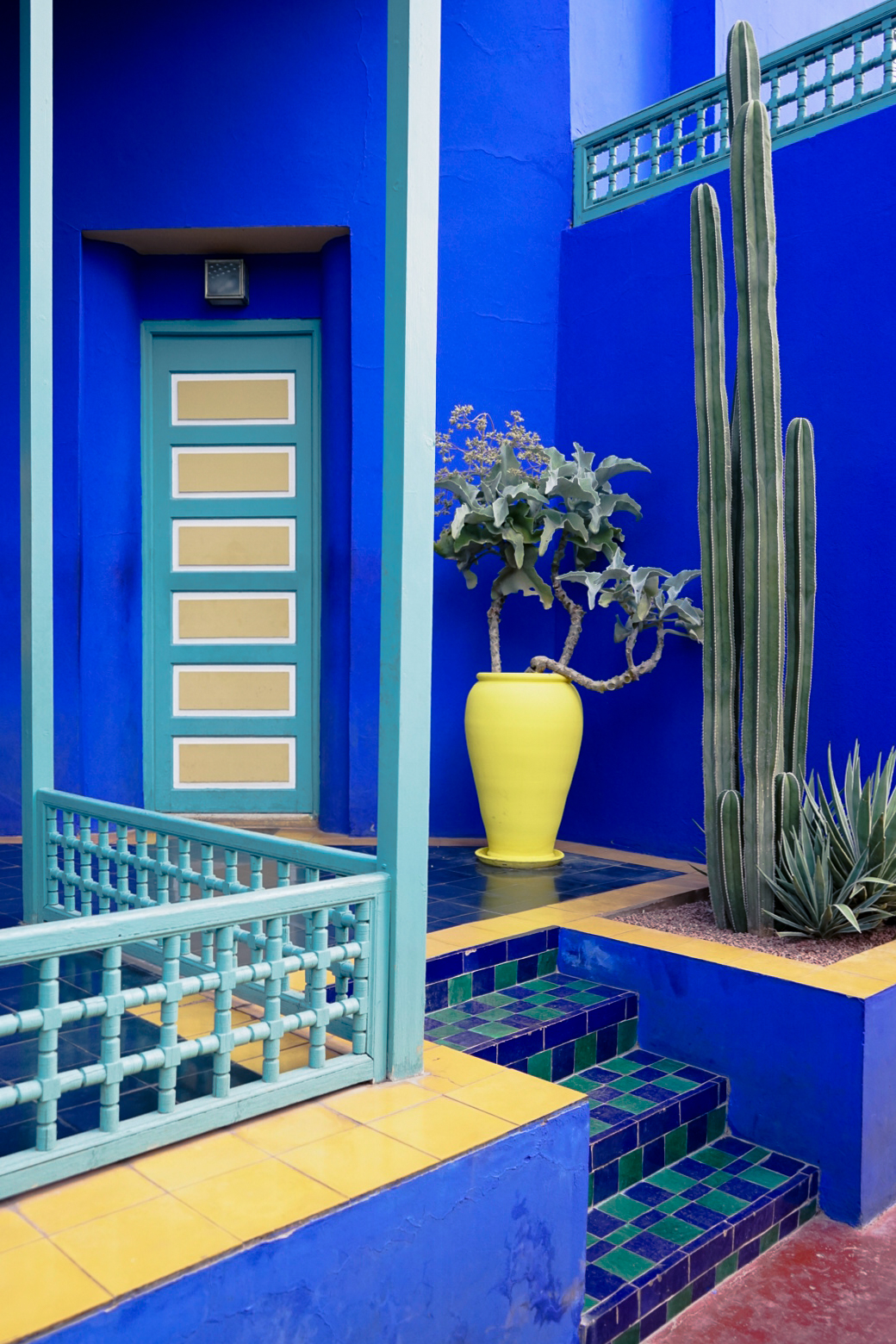 Vibrant blue architecture with yellow accents