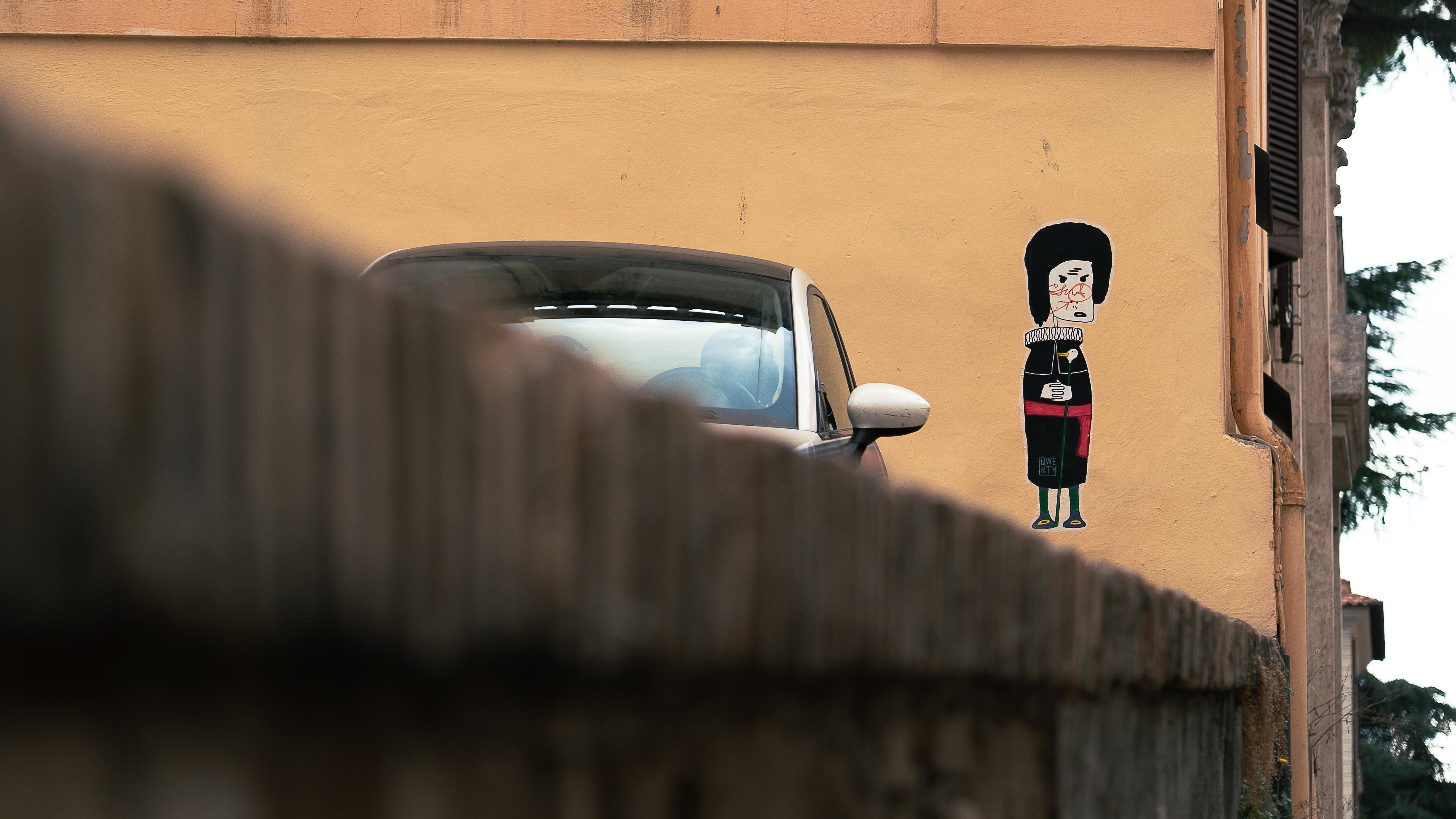 Car and street art in urban setting